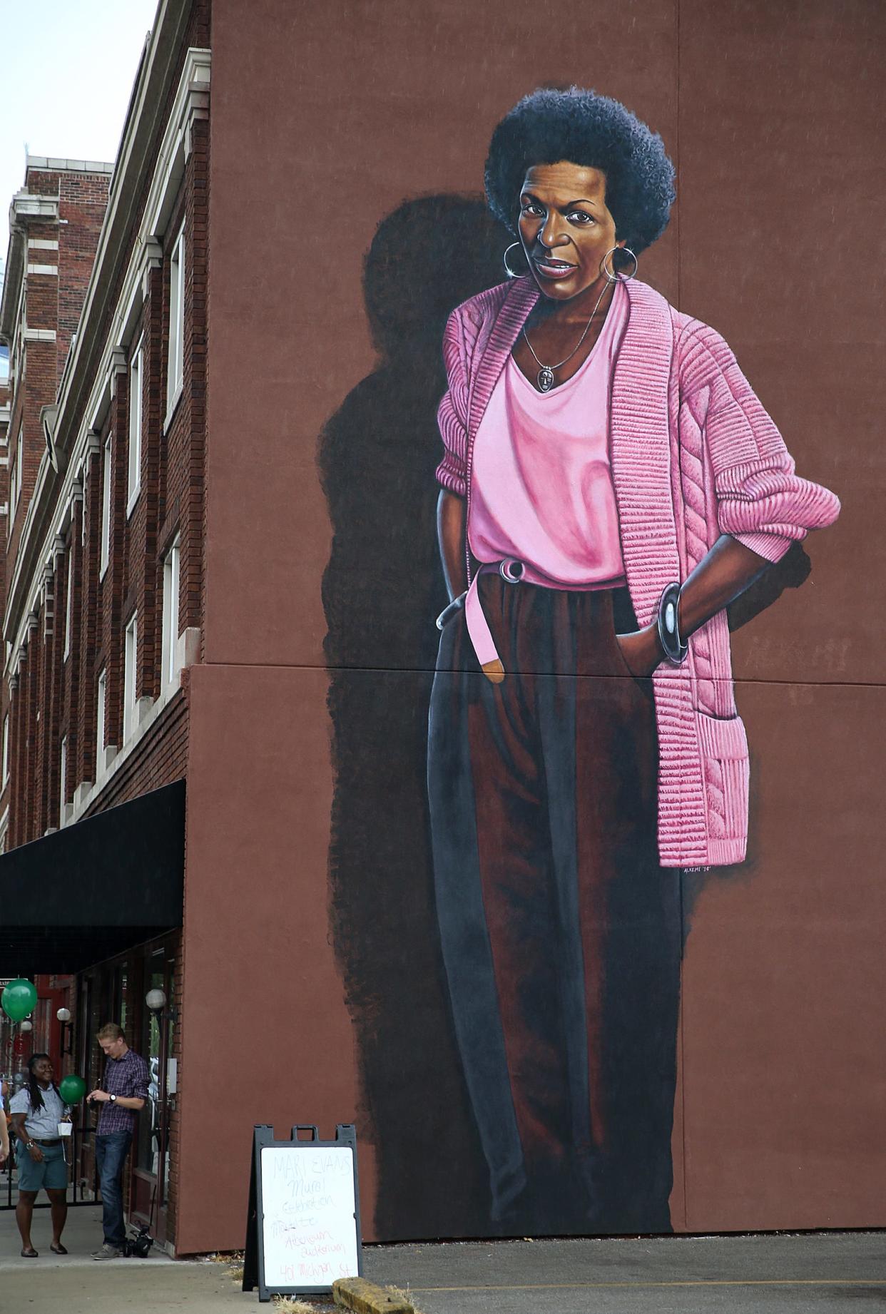 The mural depicting poet Mari Evans stands on Mass Ave. It was painted by artist Michael Alkemi Jordan.