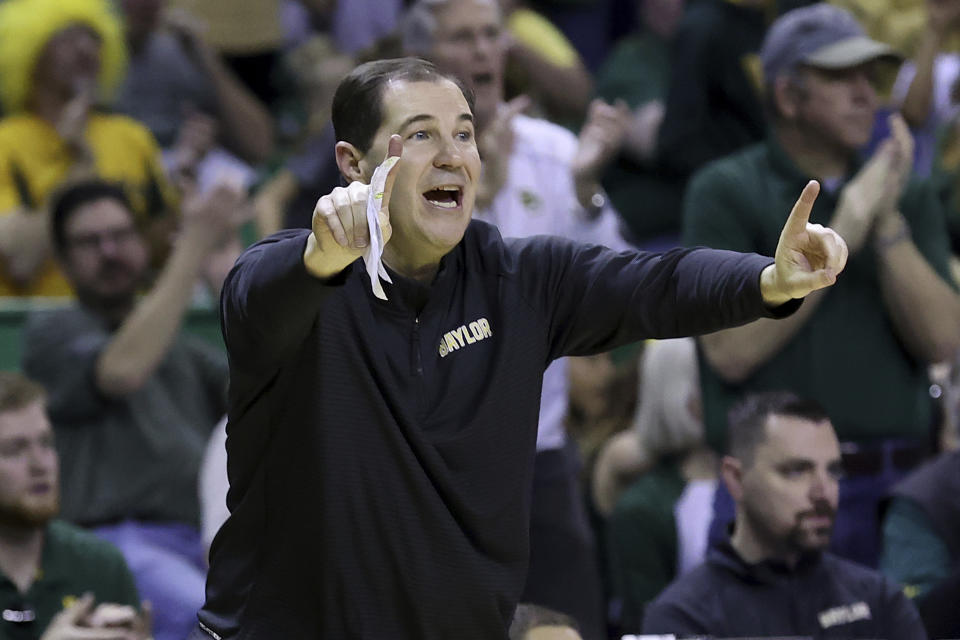 Baylor head coach Scott Drew calls a play to his team during the second half of an NCAA college basketball game Saturday, March 4, 2023, in Waco, Texas. (AP Photo/Jerry Larson)