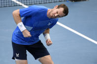 Andy Murray of Britain reacts after defeating Nikoloz Basilashvili of Georgia in their first round match at the Australian Open tennis championships in Melbourne, Australia, Tuesday, Jan. 18, 2022. (AP Photo/Andy Brownbill)