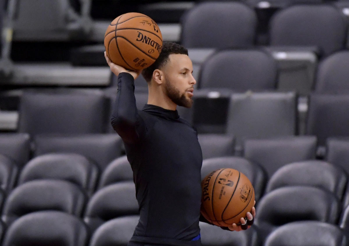 Steph Curry wears Curry 4 Flotro signature shoes at Curry Camp Yahoo