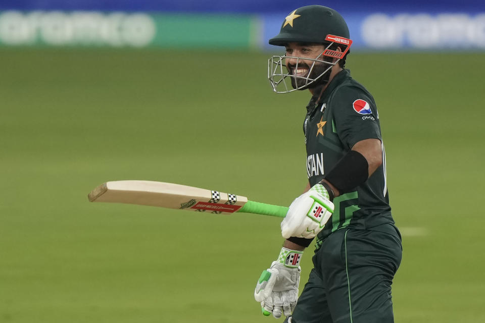 Pakistan's Mohammad Rizwan celebrates his century during the ICC Cricket World Cup warmup match between New Zealand and Pakistan in Hyderabad, India, Friday, Sept. 29, 2023. (AP Photo/Mahesh Kumar A.)