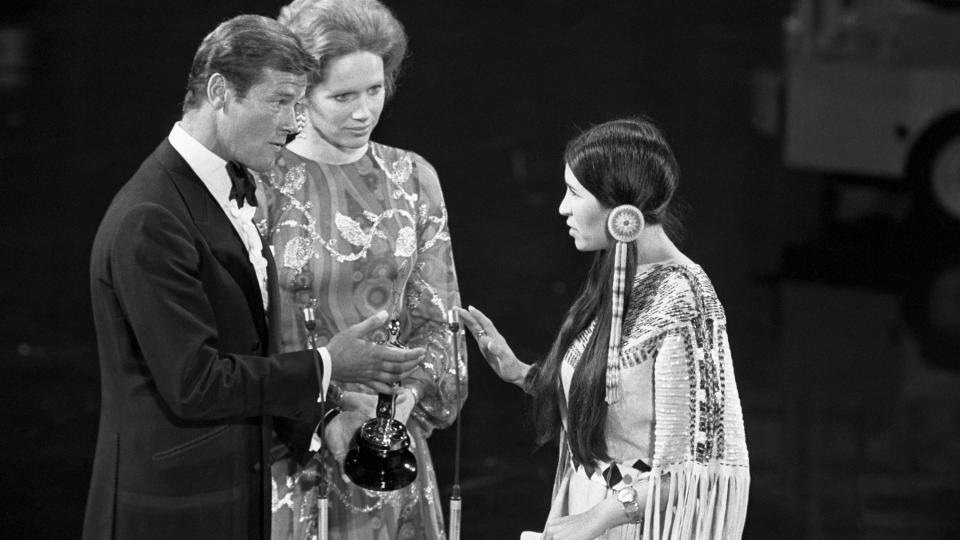 At the 1973 Academy Awards, Sacheen Littlefeather refuses the Academy Award for Best Actor on behalf of Marlon Brando who won for his role in The Godfather. She carries a letter from Brando in which he explains he refused the award in protest of American treatment of the Native Americans. 