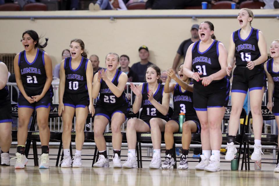 Lomega celebrates during a Class B girls state basketball tournament quarterfinal game between Calvin and Lomega at State Fair Arena in Oklahoma City, Thursday, March 2, 2023. 