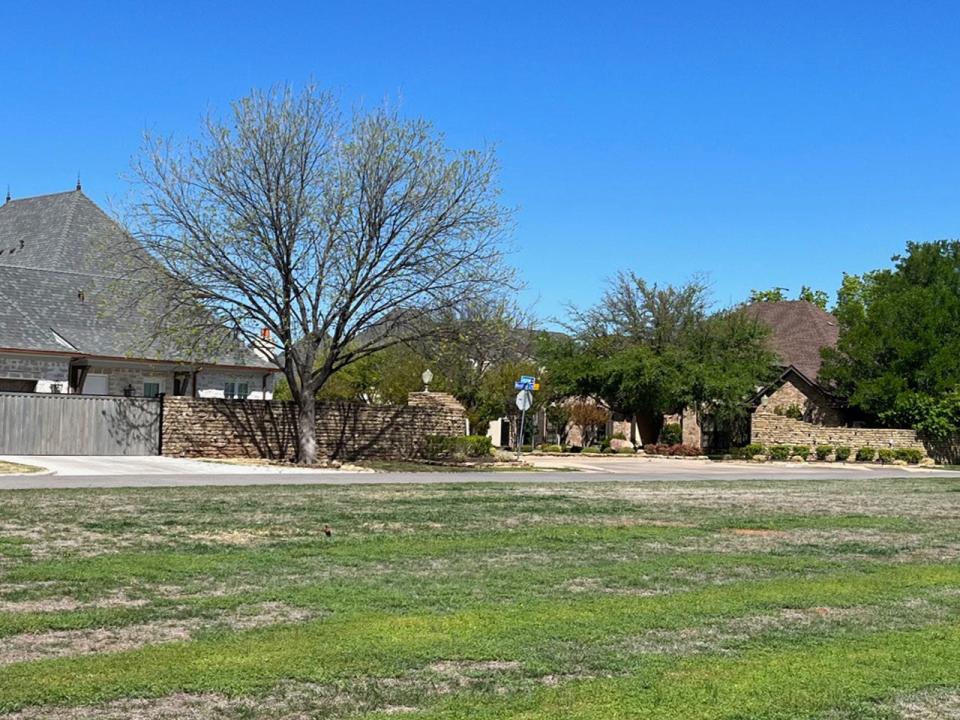 The entrance to an upscale enclave of homes was once 100 Sarasue Lane, site of the McGaha mansion.