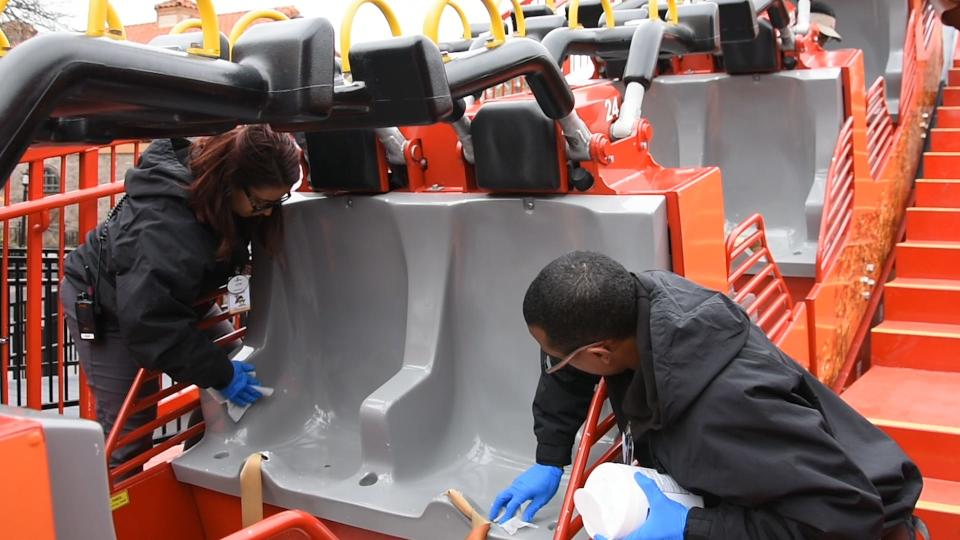 When Six Flags reopens its parks, employees will be wiping down frequently touched surfaces such as rides more often.