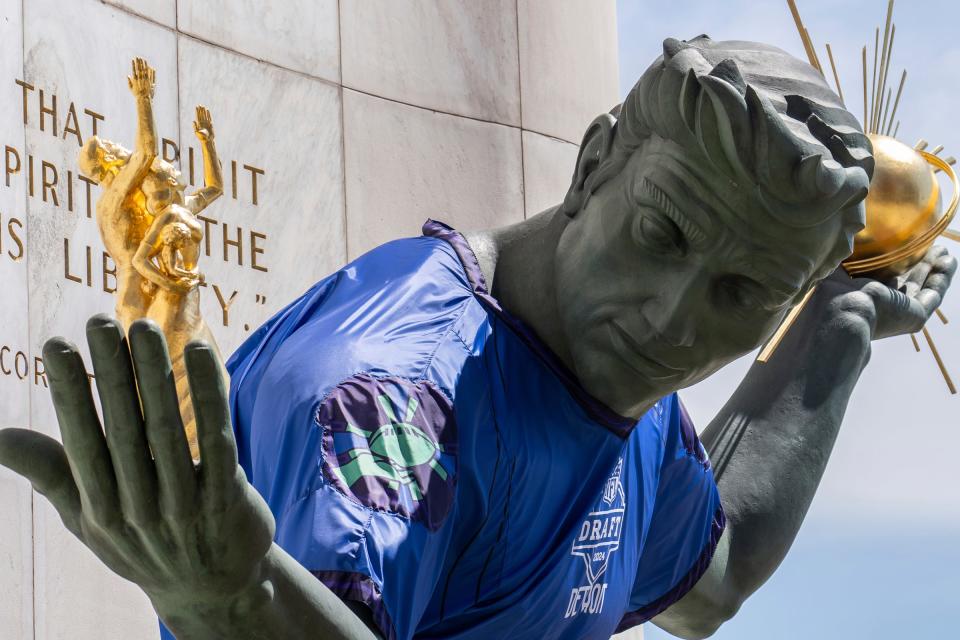 The Spirit of Detroit statue sports a jersey for the NFL draft in downtown Detroit.