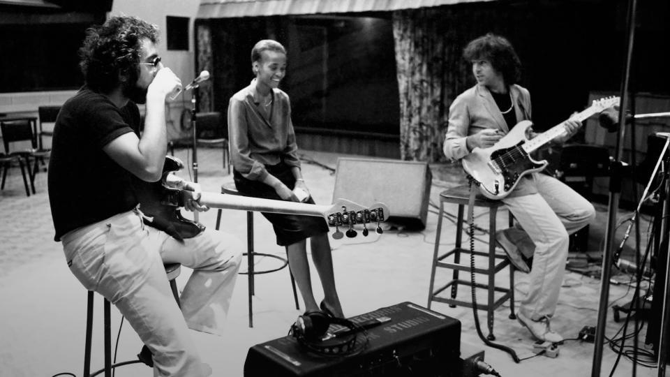Whitney Houston warms up with a band before her audition at CBS Records.