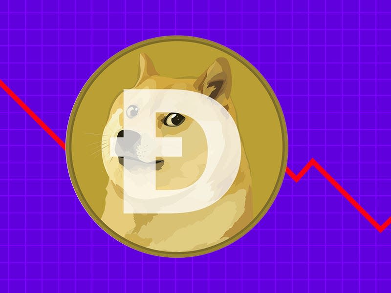 Dogecoin logo in front of a descending line chart