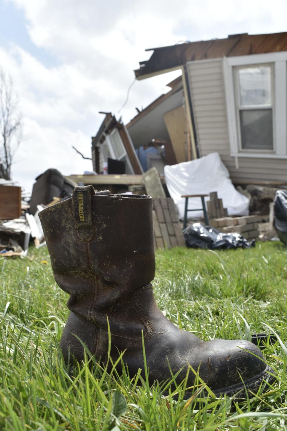 A work boot found in the aftermath of a March 31, 2023, tornado in Owen County.