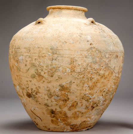 A Chinese storage jar from the Java Sea Shipwreck, which was discovered in the 1980s west of Indonesia's island of Sumatra, is shown in an image released by the Field Museum in Chicago, Illinois, U.S., May 17, 2018. Courtesy Gedi Jakovickas/The Field Museum/Handout via REUTERS
