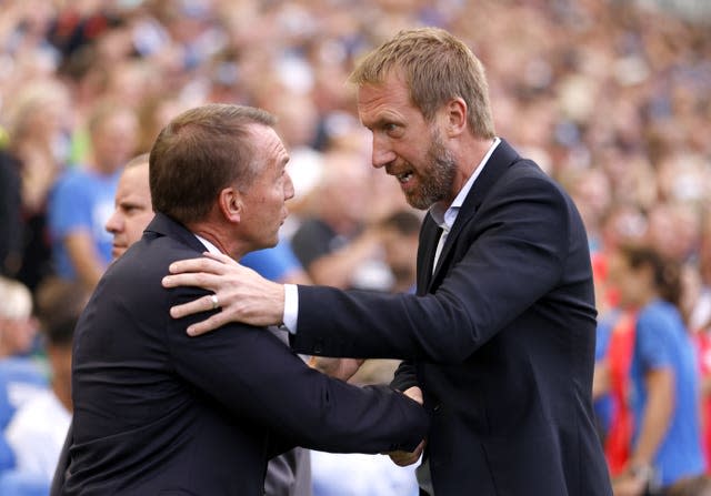 Graham Potter (right) and Brendan Rodgers shake hands