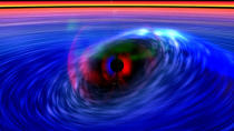 Hot iron gas rides a wave of space-time around a black hole in this computer image taken from a Rossi X-ray Timing Explorer observation.