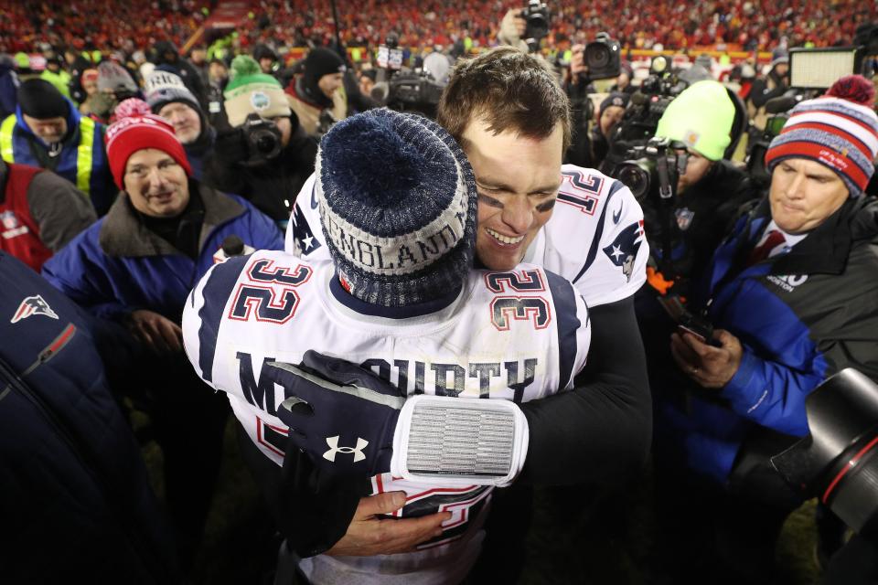 KANSAS CITY, MISSOURI - JANUARY 20: Tom Brady #12 of the New England Patriots celebrates with nn32#2 after defeating the Kansas City Chiefs in overtime during the AFC Championship Game at Arrowhead Stadium on January 20, 2019 in Kansas City, Missouri. The Patriots defeated the Chiefs 37-31. (Photo by Patrick Smith/Getty Images)