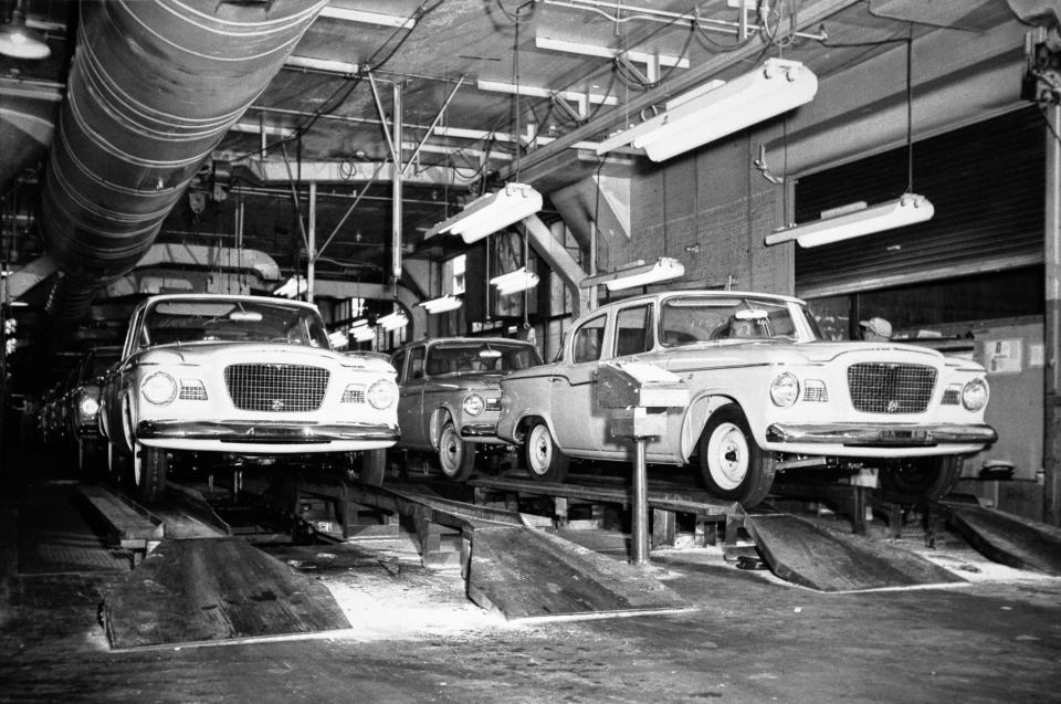 This Nov. 27, 2014, photo from the exhibit "The Assembly Line" shows Studebaker Larks about to roll off the assembly line in South Bend and be transported to dealerships around the nation.