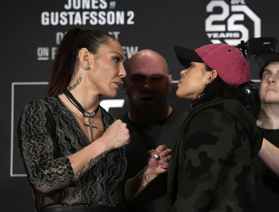 Cris Cyborg and Amanda Nunes face off during the UFC 232 press conference on Dec. 27, 2018, in Los Angeles. (Getty Images)