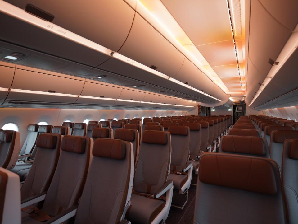 Starlux A350 economy cabin with amber coloring.