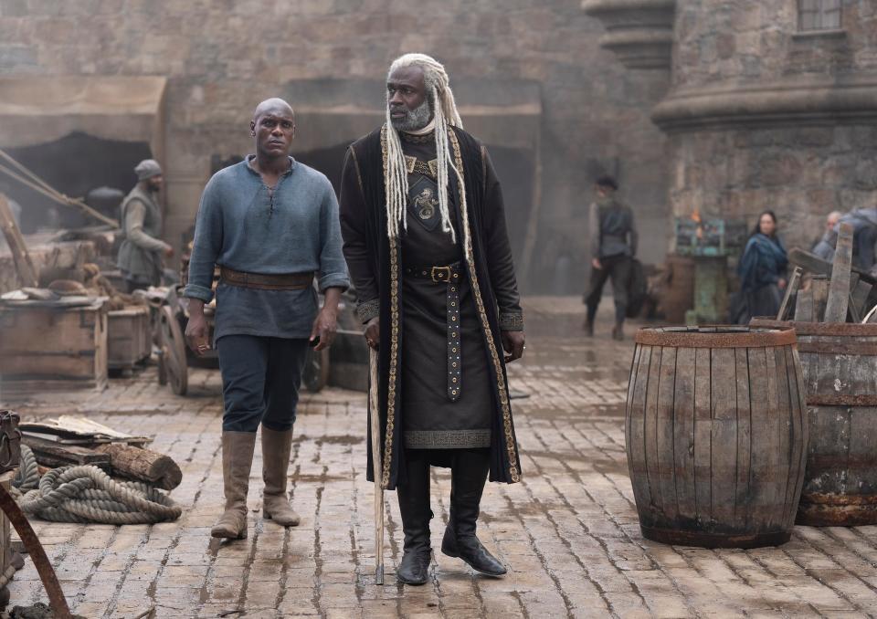 Steve Toussaint as Lord Corlys Velaryon and Abubakar Salim as Alyn of Hull in Season 2 of HBO's "House of the Dragon."
