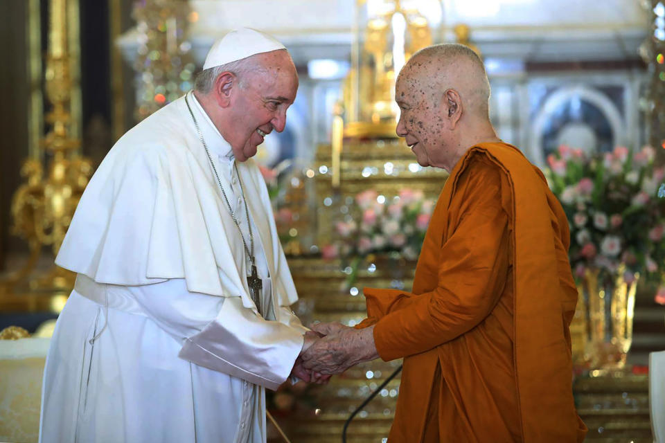 In this photo released by Wat Ratchabophit Sathit Maha Simaram Temple, Pope Francis, left, visits the Supreme Buddhist Patriarch of Thailand Somdet Phra Sangkharat Sakonlamahasangkhaparrinayok at the temple in Bangkok, Thailand Thursday, Nov. 21, 2019. (Wat Ratchabophit Sathit Maha Simaram Temple via AP)