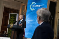 Special Presidential Envoy for Climate John Kerry listens as President Joe Biden speaks to the virtual Leaders Summit on Climate, from the East Room of the White House, Friday, April 23, 2021, in Washington. (AP Photo/Evan Vucci)