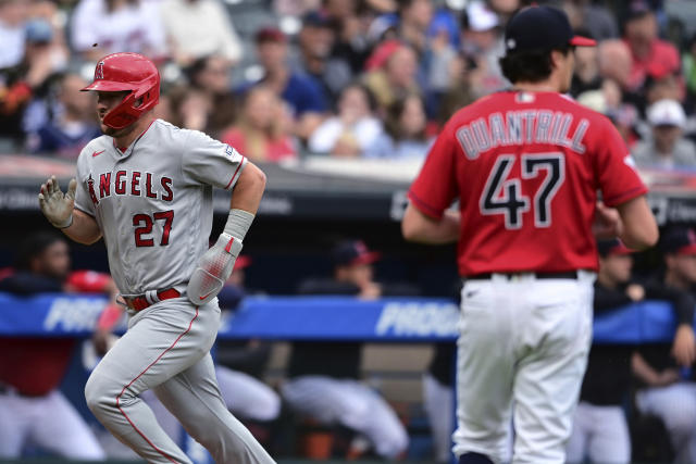 Los Angeles Angels' Mike Trout scores a run on a sacrifice fly by Anthony Rendon during the third inning of the team's baseball game against the Cleveland Guardians, Saturday, May 13, 2023, in Cleveland. (AP Photo/David Dermer)