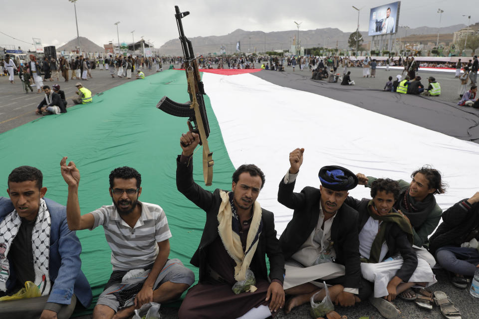 Houthi supporters attend a rally against the U.S. airstrikes on Yemen and the Israeli offensive against the Palestinians in Gaza SAtrip, in Sanaa, Yemen, Friday, March 8, 2024. (AP Photo/Osamah Abdulrahman)