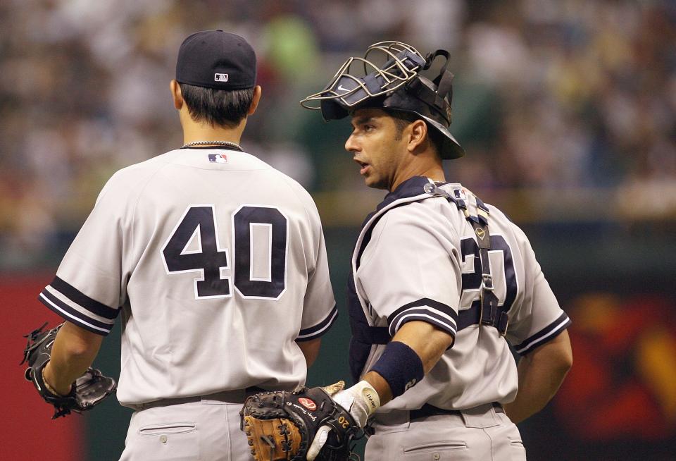 王建民與Jorge Posada。（MLB Photo by Doug Benc/Getty Images）
