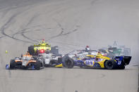 Several cars crash into each other before the start of the IndyCar auto race at World Wide Technology Raceway on Saturday, Aug. 29, 2020, in Madison, Ill. The accident caused several cars to be knocked out of the race before it officially started. (AP Photo/Jeff Roberson)