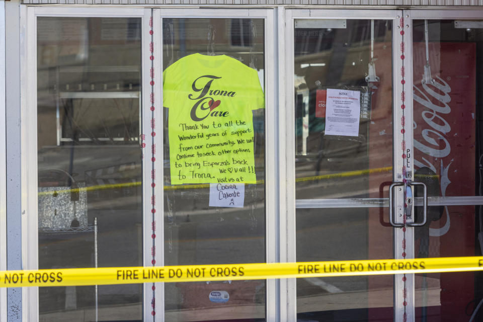 A thank you note was written in the window of Esparza's Restaurant in Trona, Calif. on Wednesday July 10, 2019. Eight buildings, including Esparza's were deemed unfit for occupancy after two earthquakes struck the area in successive days. Residents of the little community of Trona gathered at a town hall Wednesday to hear officials give updates on the recovery. (James Quigg/The Daily Press via AP)