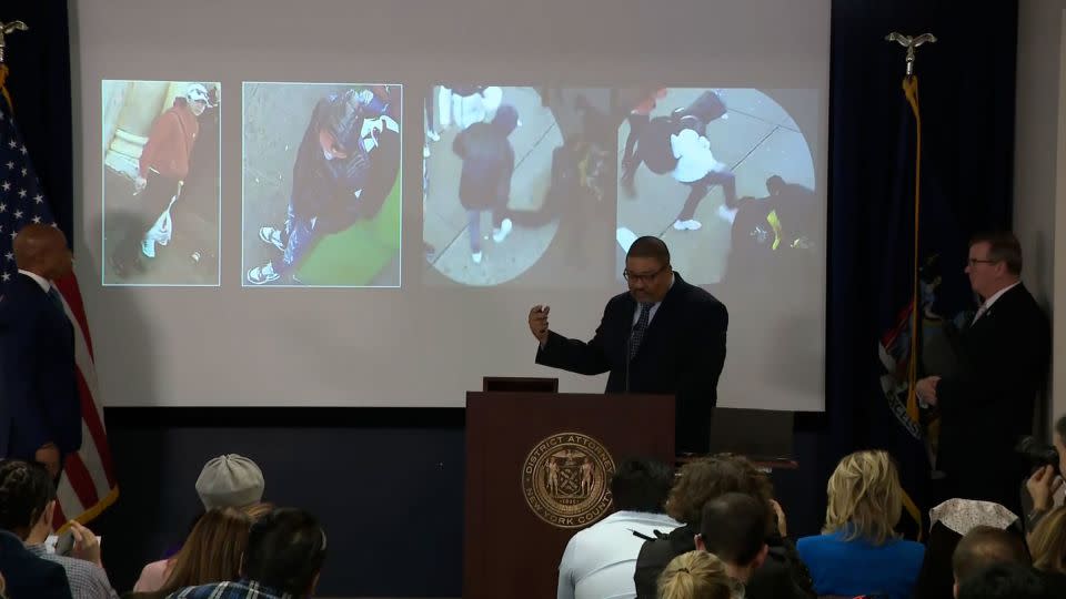 District Attorney Alvin Bragg shows images of three people he said officials are working to identify. The first three people seen from the left have not been identified, he said. - NYC Mayor's Office