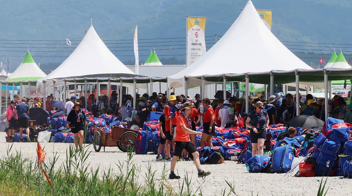 British scout members gather to leave the World Scout Jamboree campsite in Buan, South Korea (Kim Joo-hyung/Yonhap via AP)