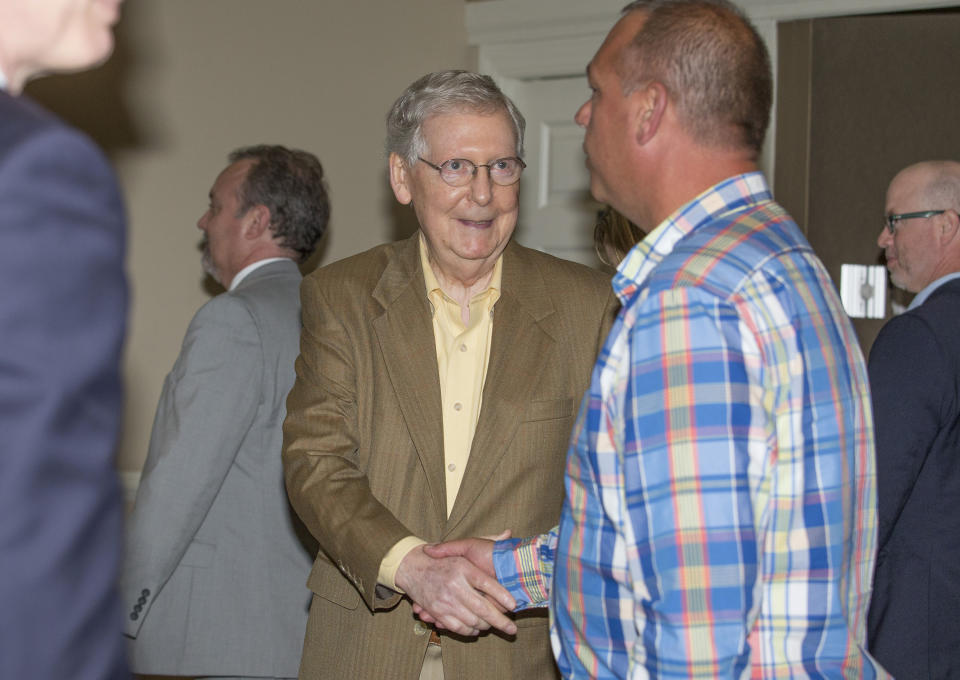 U.S. Senate Majority Leader Mitch McConnell, R-Ky., greets attendees at the Paducah Chamber luncheon at Walker Hall, Tuesday, May 28, 2019, in Paducah, Ky. (Ellen O'Nan/The Paducah Sun via AP)