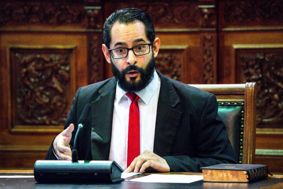 Andres Reyes of First Baptist Church in Perry speaks during a public hearing for proposed Medicaid and SNAP changes on Tuesday, April 4, 2023, at the Iowa State Capitol in Des Moines, Iowa.