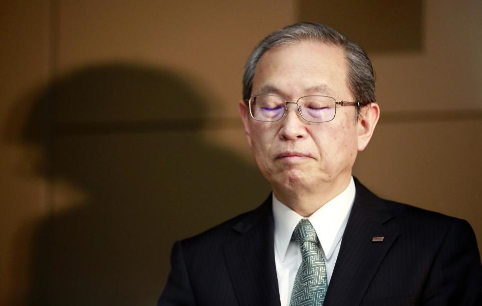 Toshiba Corp. President Satoshi Tsunakawa listens to a reporter's question during a press conference at the company's headquarters in Tokyo, Tuesday, Feb. 14, 2017. Japanese electronics and energy giant Toshiba said Tuesday that its chairman is resigning to take responsibility for problems that will result in a 713 billion yen ($6.3 billion) loss in its nuclear business. Toshiba warned, however, that unaudited financial results it announced may change "by a wide margin." It earlier delayed reporting its official financial results by a month, citing auditing problems related to the losses in its nuclear business. That sent Toshiba stock tumbling 8 percent in Tokyo trading. (AP Photo/Shizuo Kambayashi)