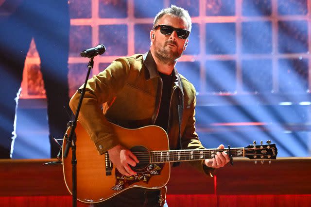 <p>Astrida Valigorsky/WireImage</p> Eric Church performs onstage during the 57th Annual CMA Awards at Bridgestone Arena in November 2023
