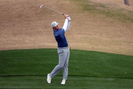 Jan 20, 2017; La Quinta, CA, USA; Hudson Swafford hits off the ninth fringe during the second round of the CareerBuilder Challenge at PGA West - Nicklaus Private Course. Mandatory Credit: Joe Camporeale-USA TODAY Sports