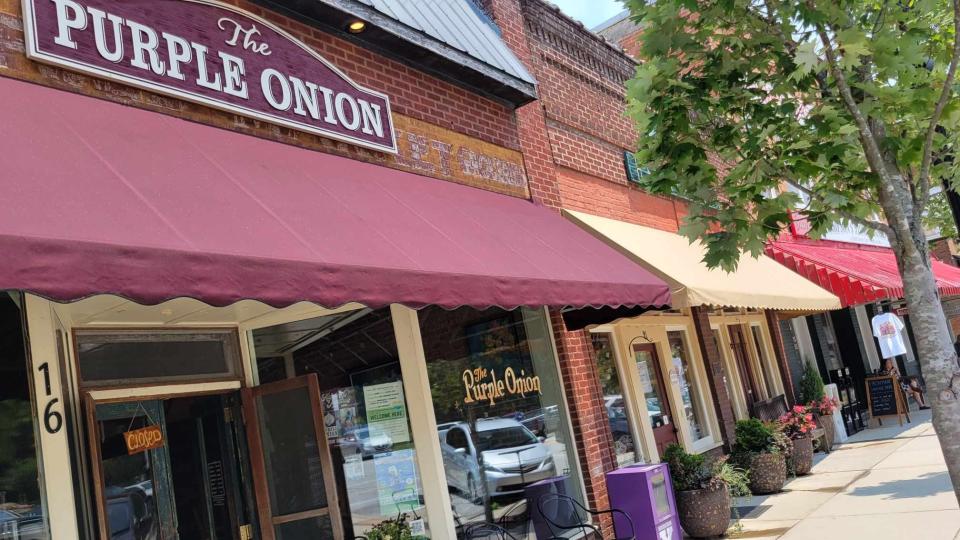 One of the popular dining destinations for visitors to Saluda is The Purple Onion on Main Street.