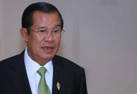 Cambodia's Prime Minister Hun Sen arrives at the National Assembly of Cambodia during a plenary session in Phnom Penh February 14, 2018. REUTERS/Samrang Pring