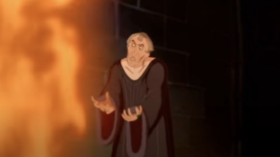 frollo singing into fire