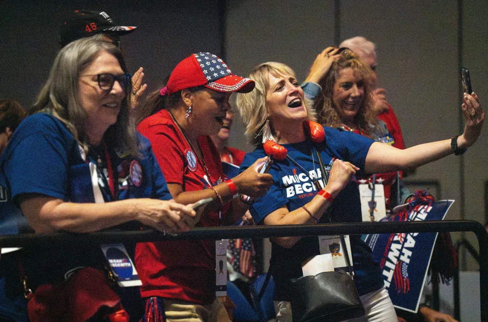 Spectators cheer with the announcement that Micah Beckwith is the Republican nominee for lieutenant governor Saturday, June 15, 2024, during the 2024 Indiana GOP State Convention in Indianapolis, Ind.