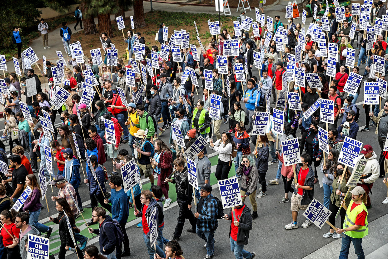 University of California academic workers strike walking the picket line on the Campus of the University of California, Los Angeles on Nov. 28, 2022 in Los Angeles. (Gary Coronado / Los Angeles Times via Getty Images)