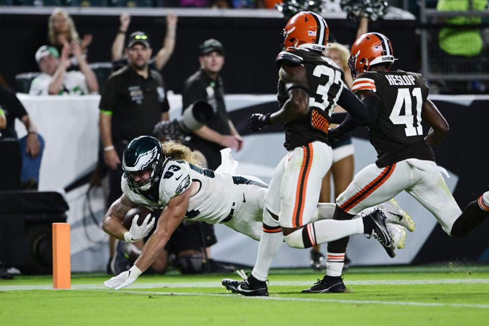 Philadelphia Eagles tight end Brady Russell (83) scores a touchdown during the second half of an NFL preseason football game against the Cleveland Browns on Thursday, Aug. 17, 2023, in Philadelphia. (AP Photo/Derik Hamilton)