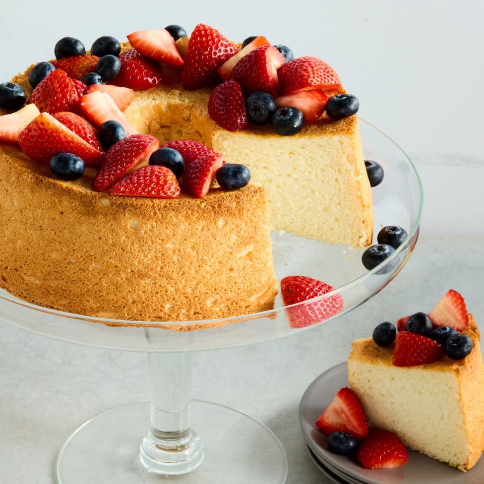 angel food cake topped with strawberries and blueberries