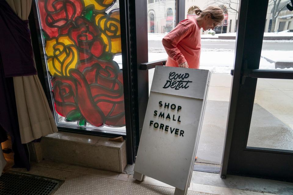Angela Wisniewski-Cobbina works in her clothing store that she opened just before the pandemic called Coup D’état in New Center in Detroit on Friday, March 22, 2024. Wisniewski-Cobbina is planning to move her store to the east side, near the Shepherd on Kercheval.