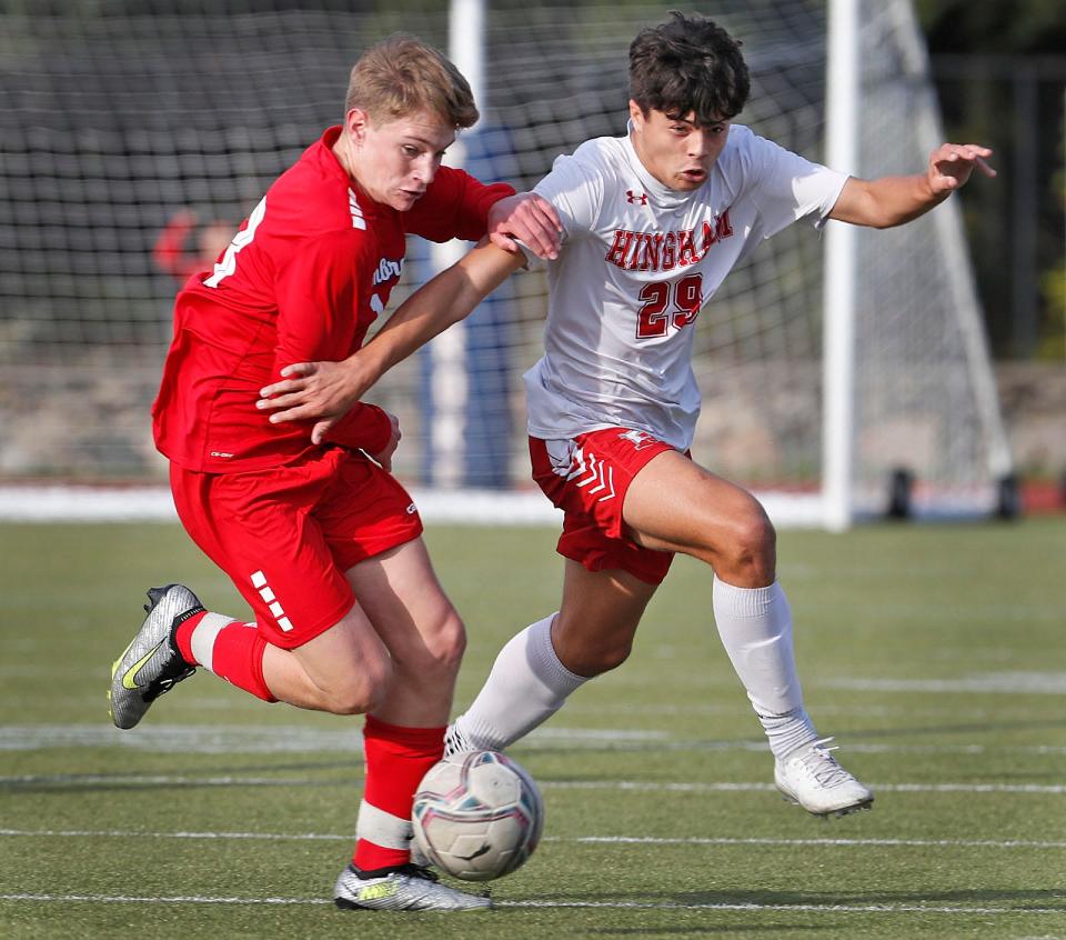 Pembroke #13 Danny Flynn and Hingham #29 Michael McNabb battle for the ball.

Pembroke hosted Hingham boys soccer on Tuesday, Oct. 10, 2023