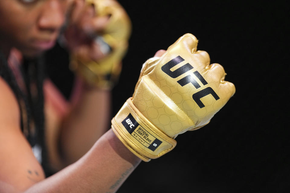 This undated photo provided by UFC shows the redesigned UFC official fight glove. UFC is set to unveil fighter gloves overhauled to minimize cuts and abrasions, but in large part designed to stunt eye pokes that often render fighters unable to continue, the first major change of the protective equipment in more than a decade. The global MMA leader made the impact-absorbing gloves mandatory, starting with Saturday’s UFC 302 card in New Jersey. (UFC via AP)