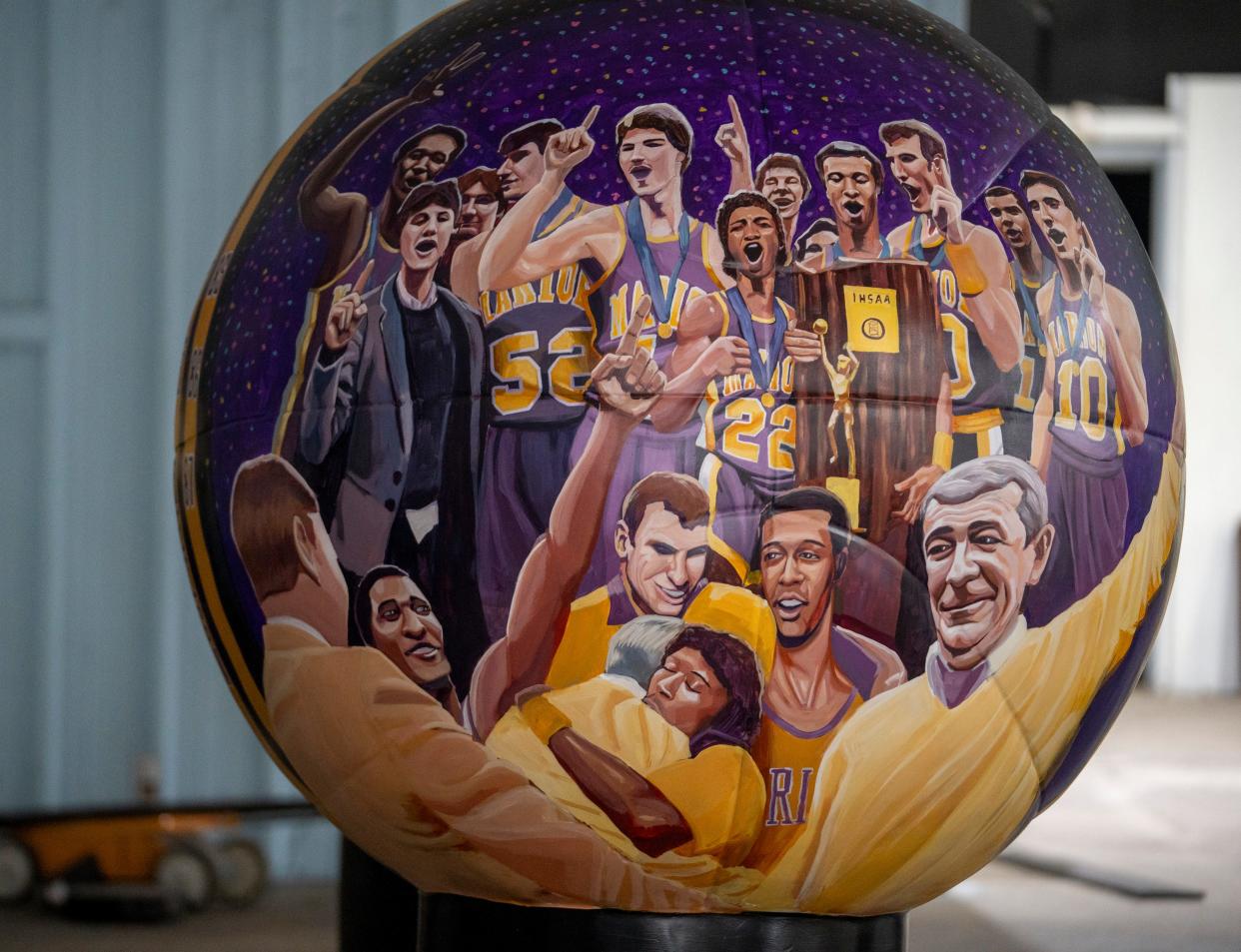 Christopher Catalogna’s art remembers the Marion High School boys teams of 1985-’87, on Monday, Feb. 5, 2024, about two weeks before the NBA All-Star Game. A total of 24 sculptures are made by Hoosier artists that depict various elements of hoops-happy Indiana.