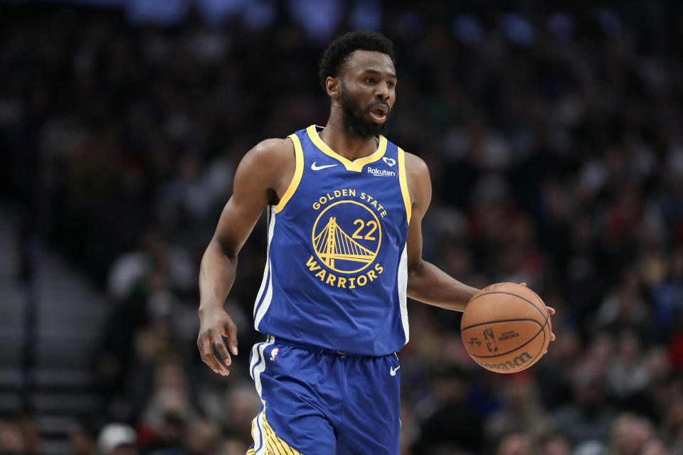 PORTLAND, OREGON - APRIL 11: Andrew Wiggins #22 of the Golden State Warriors brings the ball up court during the first quarter against the Portland Trail Blazers at Moda Center on April 11, 2024 in Portland, Oregon. NOTE TO USER: User expressly acknowledges and agrees that, by downloading and or using this photograph, User is consenting to the terms and conditions of the Getty Images License Agreement.  (Photo by Amanda Loman/Getty Images)