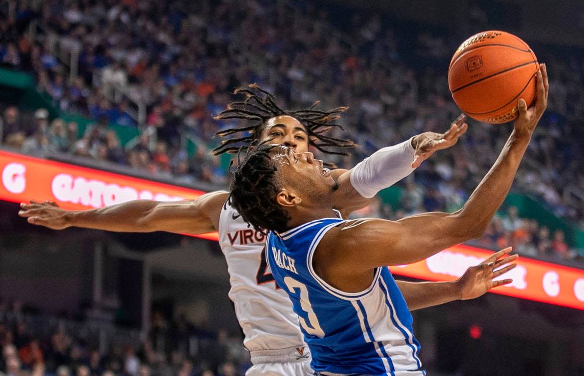 Duke’s Jeremy Roach (3) drives to the basket against Virginia’s Armaan Franklin (4) during the first half in the championship game of the ACC Tournament on Saturday, March 11, 2023 at the Greensboro Coliseum in Greensboro, N.C.