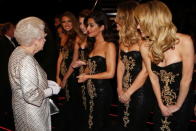 <p>Chezza and the rest of the Girls Aloud gang looked very chic in matching LBD’s with gold floral detail.<i> [Photo: ANDREW WINNING/AFP/Getty Images]</i></p>