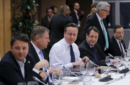 British Prime Minister David Cameron (C) attends a meeting with European Union leaders during a EU summit addressing the talks about the so-called Brexit and the migrants crisis, in Brussels, Belgium, February 19, 2016. REUTERS/Olivier Hoslet/Pool